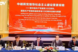 The seminar held in Hanoi on July 8 shares the key experiences of the Communist Party of China and the Communist Party of Vietnam in leading the cause of socialism building. (Photo: VOV)