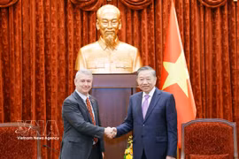 General Secretary of the Communist Party of Vietnam Central Committee and State President To Lam (R) and Belgian Ambassador Karl Van den Bossche. (Photo: VNA)