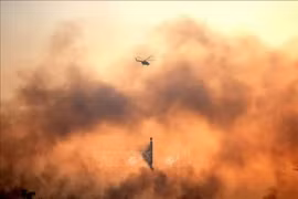 Smoke rises from a land fire in South Sumatra, Indonesia (Photo: Xinhua/VNA)