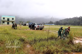 Joint exercise to arrest armed drug trafficking and transportation offenders crossing the Vietnam–Laos border. (Photo: VNA)
