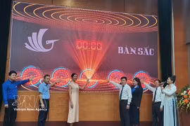 Delegates press the button to officially launch the “Ban Sac” programme 2026. (Photo: VNA)