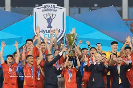 The Vietnam national men’s football teamsuccessfully defend their title as the champion of Southeast Asia's premier tournament, bringing its total number of championship wins to four (Photo: VNA)