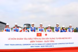 Delegates at the first train arrival ceremony of Ho Chi Minh City urban railway construction project Ben Thanh - Suoi Tien (Photo: VNA) 