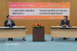 Prof. Dr. Nguyen Xuan Thang, Member of the Political Bureau and Chairman of the Central Council for Theoretical Studies (right) and Shii Kazuo, Chairman of the JCP Central Committee at the exchange (Photo: VNA)