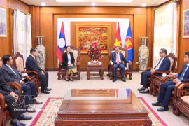 A delegation from the Lao People’s Revolutionary Party (LPRP) Central Committee's Inspection Commission, led by Deputy Chairwoman Pingkham Lasasimma, visits the Vietnamese Embassy in Vientiane to extend congratulations. (Photo: VNA)