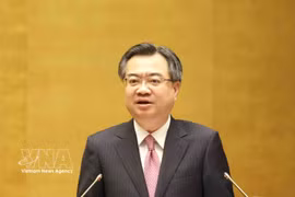 Politburo member, Secretary of the Party Central Committee, Chairman of the Party Central Committee's Commission for Policies and Strategies Nguyen Thanh Nghi speaks at the national conference to disseminate and implement resolutions adopted at the third plenum of the 14th Party Central Committee on July 29. (Photo: VNA)