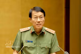 Politburo member and Minister of Public Security General Luong Tam Quang speaks at a national conference held on July 29 to disseminate and implement the resolutions adopted at the third plenum of the 14th Party Central Committee. (Photo: VNA)