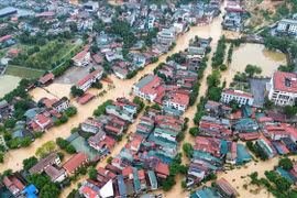 More than 5,000 households in Yen Bai ward, Lao Cai province, are affected by flood. (Photo: VNA)