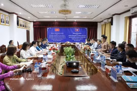 The talks between officials of Vietnam's Dien Bien province and Bokeo province of Laos on September 16 (Photo: VNA)