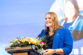 Kendra Rinas, Chief of Mission for IOM Vietnam speaks at the event. (Photo: VNA)