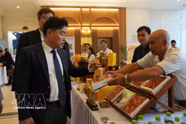 Members of the RoK delegation visit booths showcasing signature agricultural products of Da Lat – Lam Dong. (Photo: VNA)