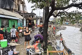 Houses are damaged by flooding in the Bukit Barisan Street area, Denpasar, Bali on September 10. (Photo: Antara)