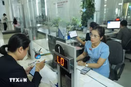 Saigon ward effectively implements electronic authentication to serve people. (Photo: VNA)