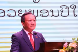 Vietnamese Ambassador to Laos Nguyen Minh Tam speaks at the get-together. (Photo: VNA)