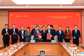The Commission for Management of State Capital at Enterprises transfers the rights and responsibilities of the agency representing state capital ownership to the Ministry of Finance. (Photo: VNA)