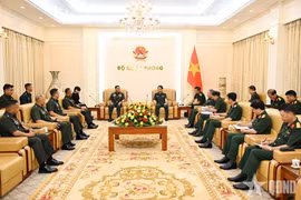 Vietnamese Deputy Prime Minister and Minister of National Defence General Phan Van Giang (centre, right) and General Romeo Brawner Jr., Chief of Staff of the Armed Forces of the Philippines, at their meeting in Hanoi on June 3, 2026. (Photo: qdnd.vn)
