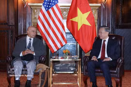 General Secretary of the Communist Party of Vietnam (CPV) Central Committee and President To Lam (R) and Communist Party USA Co-Chair Joe Sims (Photo: VNA)