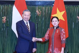 Party General Secretary To Lam (L) meets with Speaker of the People's Representative Council of Indonesia Puan Maharani in Jakarta on March 11. (Photo: VNA