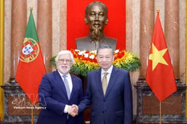 Party General Secretary and State President To Lam (R) receives Portuguese Ambassador Joaquim Alberto De Sousa Moreira De Lemos in Hanoi on July 6. (Photo: VNA)