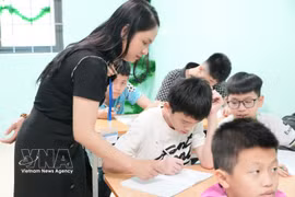 At a classroom for hearing-and-speech impaired children in Bac Ninh province. (Photo: VNA)