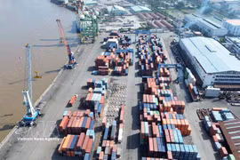 Cargo handling activities are bustling at Saigon Port. (Photo: VNA)