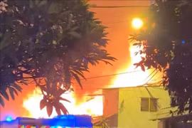 Scene of the fire in Ho Chi Minh City's District 8 that claims three lives. (Photo: VNA)