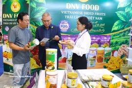 Visitors explore products at the fair (Photo: VNA)