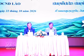 Vietnamese Ambassador to Laos Nguyen Minh Tam (L) and Lao Deputy Minister of Agriculture and Environment Xaynakhon Inthavong co-chair the conference. (Photo: VNA)