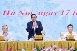 Prime Minister Pham Minh Chinh chairs the the second meeting of the government steering committee for the development of science, technology, innovation and digital transformation, and Project 06 on May 17. (Photo: VNA)