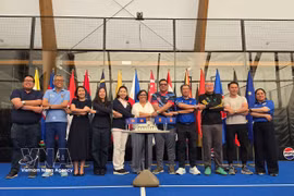 Ambassadors of ASEAN member states in Brussels perform the bloc’s signature “ASEAN handshake”, symbolising ASEAN solidarity (Photo: VNA) 