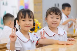 All public school students, from preschool to high school, will be exempt from tuition fees starting in the 2025–2026 academic year, starting this September. (Photo: VNA)