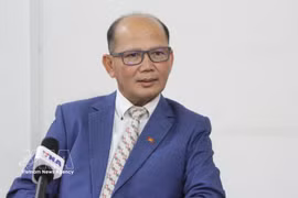 Uch Leang, Acting Director of the Department of Asia, Africa and Middle East Studies at the Royal Academy of Cambodia’s Institute of International Relations speaks to Vietnam News Agency correspondents in Phnom Penh (Photo: VNA)