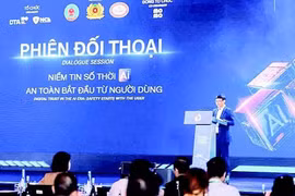 A panel discussion on “Digital trust in the AI era: Security starts with the users” at the Digital Trust in Finance 2026 forum (Photo: nhandan.vn)