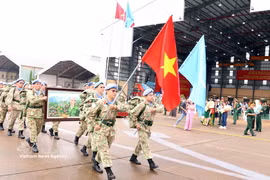 On the morning of September 22, 2025, at Tan Son Nhat International Airport in Ho Chi Minh City, the Ministry of National Defence held a send-off ceremony for Level-2 Field Hospital Rotation 7 and Engineer Unit Rotation 4 as they departed to undertake United Nations peacekeeping missions at the UN Mission in South Sudan (UNMISS) and the Abyei Area under the UN Interim Security Force for Abyei (UNISFA). (Photo: VNA)