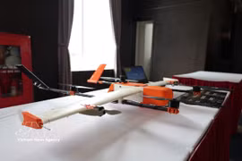 A display area featuring unmanned aerial vehicles (UAVs) at the UAV Technology Seminar in Da Nang city (Photo: VNA)