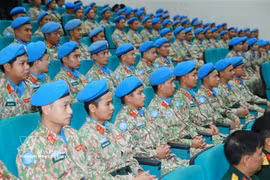 Officers of the Engineering Unit Rotation 4 and Level-2 Field Hospital Rotation 7 attend the conference (Photo: VNA)