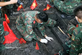 The search for fallen soldiers’ remains has been conducted by Military Region 7 carefully, meticulously and in accordance with regulations, ensuring that no remains are left undiscovered (Photo: VNA)