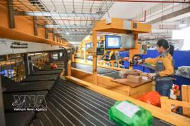 Vietnam Post accelerates the adoption of modern technology, elevates logistics capabilities, and boosts the digital economy. (Photo: VNA)