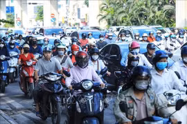 Emission inspections for motorcycles and motorised vehicles will begin in Hanoi and Ho Chi Minh City on July 1, 2027. (Photo: VNA)