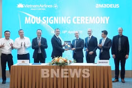At the signing ceremony between Vietbam Airlines and Amadeus IT Group (Photo: VNA)