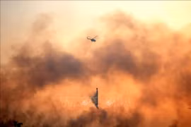 Smoke rises from a land fire in South Sumatra province, Indonesia (Photo: Xinhua/VNA)