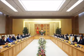 Prime Minister Pham Minh Chinh holds a meeting with a delegation of Swiss and European businesses led by Dr Philipp Rösler, President of the Swiss–Viet Economic Forum, on February 3, 2026. (Photo: VNA)