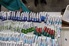 The tubes of toothpaste containing drugs seized in the case. (Photo published by VNA)