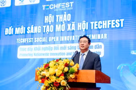 Pham Hong Quat, Director of the National Agency for Technology Entrepreneurship and Commercialisation Development (NATEC), speaks at the TECHFEST Vietnam 2025 seminar in Hanoi on December 12. (Photo: VNA)