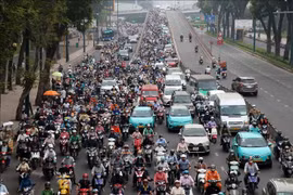 Electric vehicles are increasingly seen on roads in Ho Chi Minh City. (Photo: VNA)