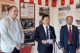 Vincent Boulet (first, left), French Communist Party (PCF)’s foreign affairs head, attends the opening of Nhan Dan (People) newspaper's display at an event in September 2024. (Photo: VNA)