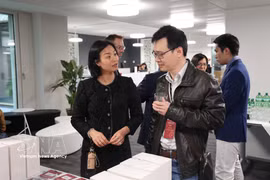 Ly Pham and Luu Vinh Toan at an event in Zurich (Photo: VNA)