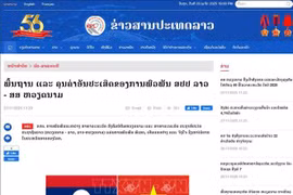 The article praising the great friendship between Vietnam and Laos is published on the Pathet Lao online newspaper of the Lao News Agency. (Photo: VNA)