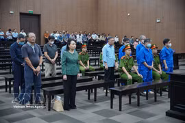 The defendants listen as the court pronounces the sentences. (Photo: VNA)