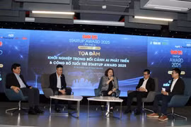 Experts and businesspeople discuss AI applications for startups. (Photo: VNA)
